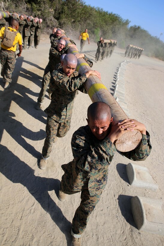 Recruit Boonleua Lee, Platoon 2145, Golf Company, 2nd Recruit Training Battalion, leads a group of seven recruits through a log drill exercise at Marine Corps Recruit Depot San Diego, Calif., July 8. Lee is a Yuba City, Calif., native, and was recruited out of Recruiting Substation Yuba City, Calif.