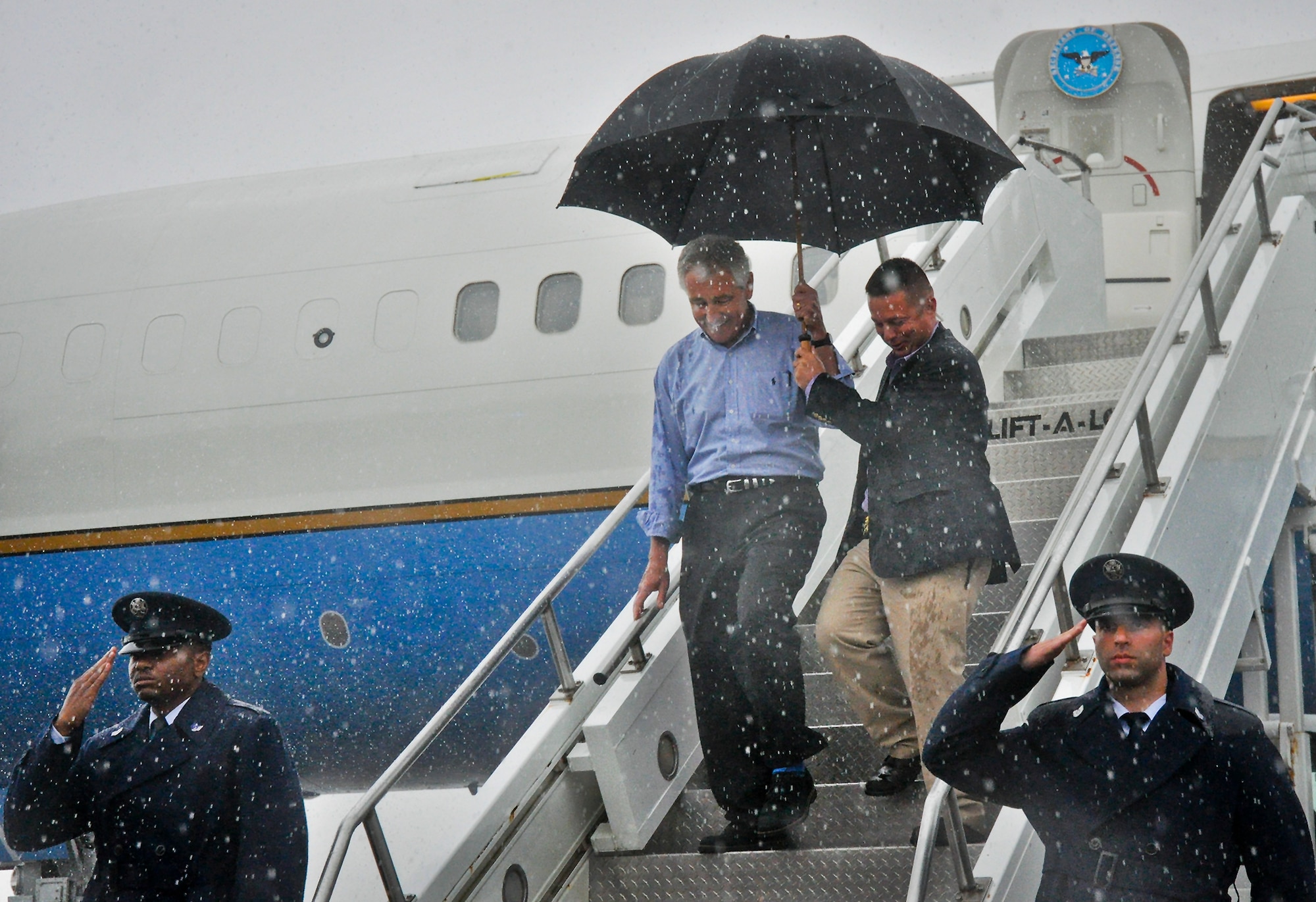 Defense Secretary Chuck Hagel walks off the plane July 9, 2014, after arriving at Eglin Air Force Base, Fla.. Hagel visited the base to tour the 33rd Fighter Wing and F-35 Lightning II integrated training center. (U.S. Air Force photo/Ilka Cole)