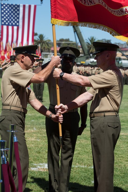 Lt. Gen. David H. Berger (left) assumes command of I Marine Expeditionary Force from Lt. Gen. John A. Toolan (right) during the most recent MEF change of command ceremony aboard Marine Corps Base Camp Pendleton, Calif., July 11, 2014. Berger formerly served as the commanding general of Marine Corps Air Ground Combat Center. (U.S. Marine Corps photo by Lance Cpl. Nathan Castillo)