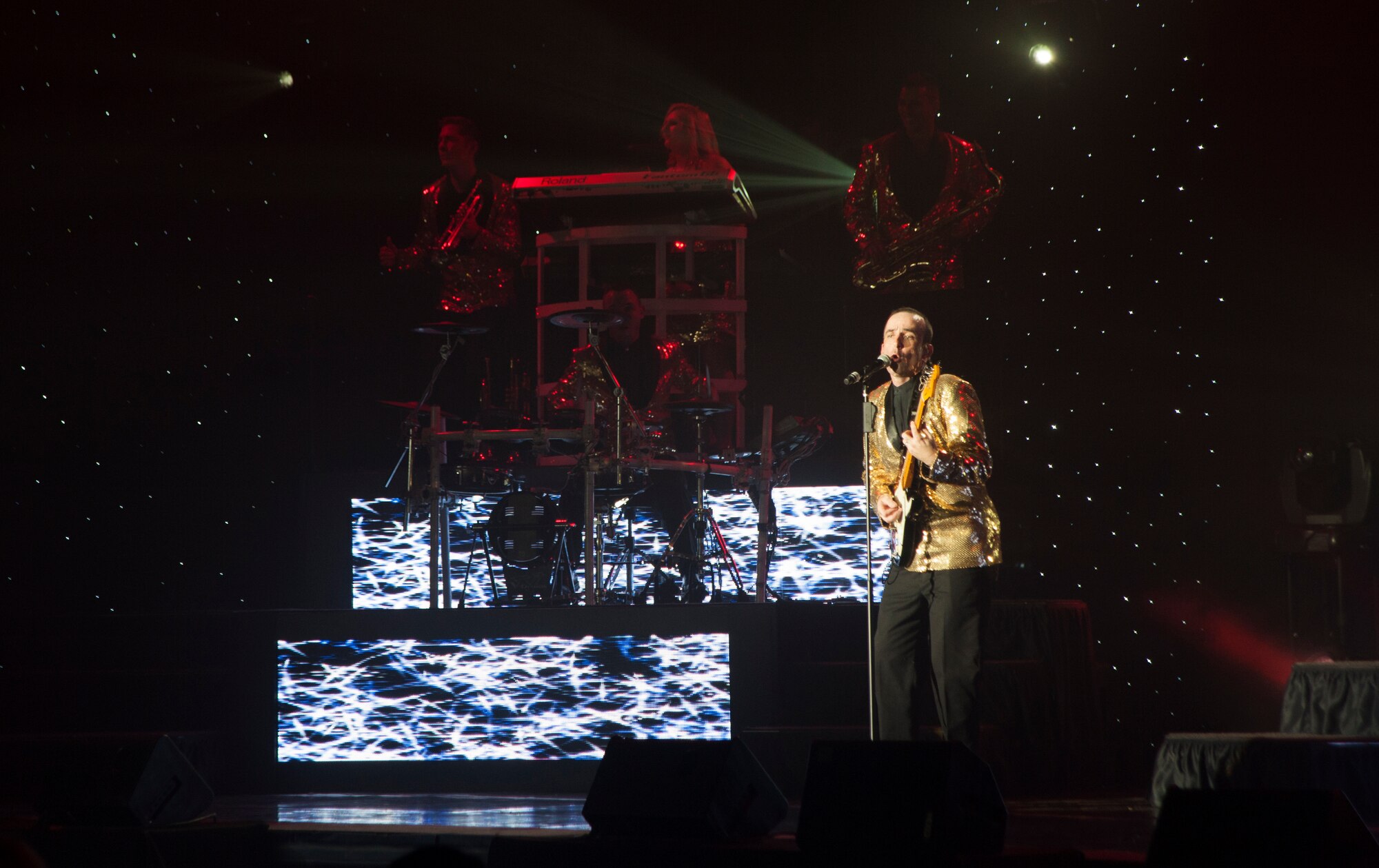 Members of Tops In Blue perform July 11, 2014, Cabrillo High School, Lompoc, Calif. Celebrating 60 years of tradition, Tops In Blue performed for Vandenberg personnel, families and members of the local community. (U.S. Air Force photo by Senior Airman Armando Aparicio/Released)