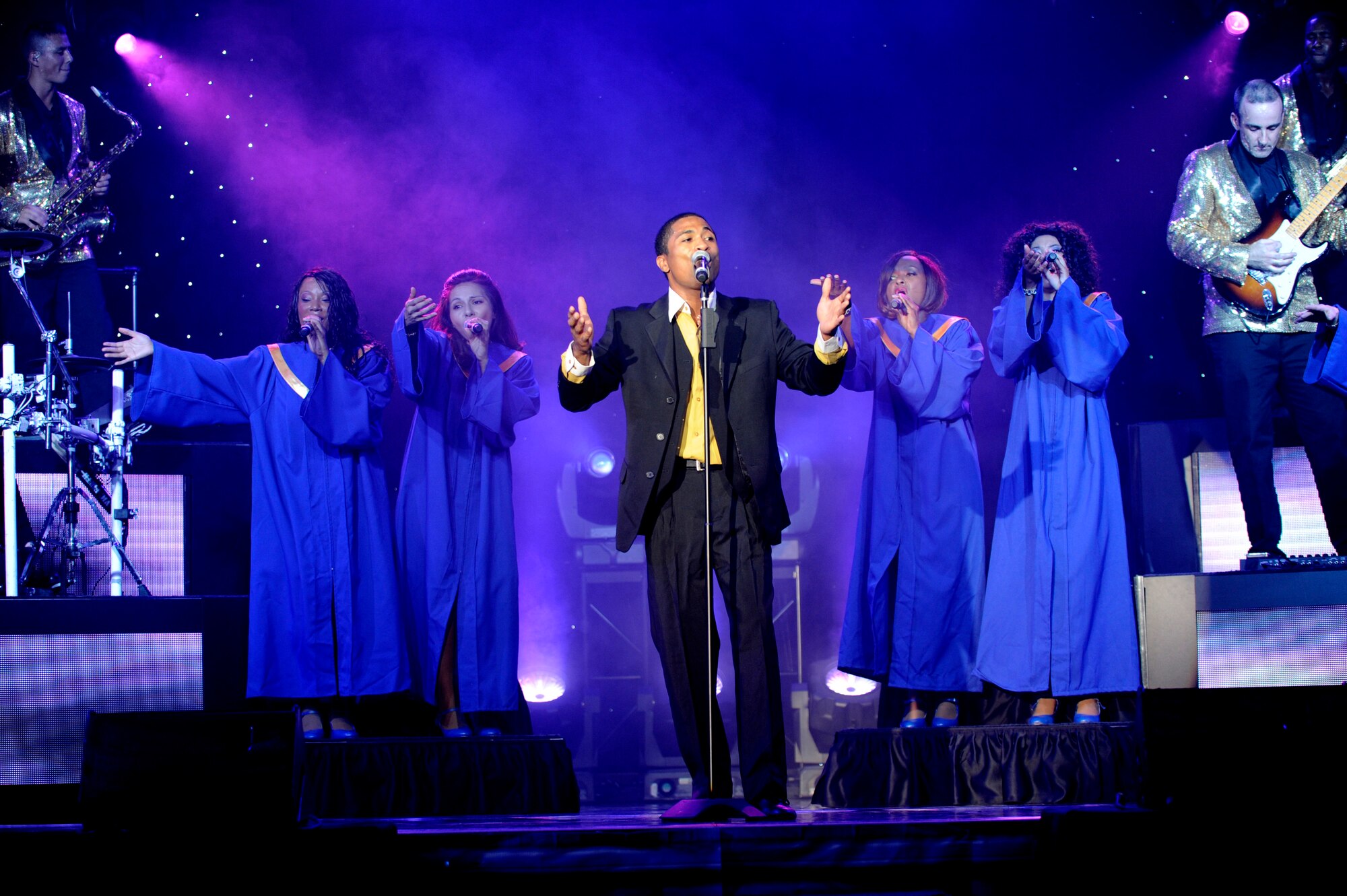 Members of Tops In Blue perform July 11, 2014, Cabrillo High School, Lompoc, Calif. Celebrating 60 years of tradition, Tops In Blue performed for Vandenberg personnel, families and members of the local community. (U.S. Air Force photo by Senior Airman Shane Phipps/Released)   