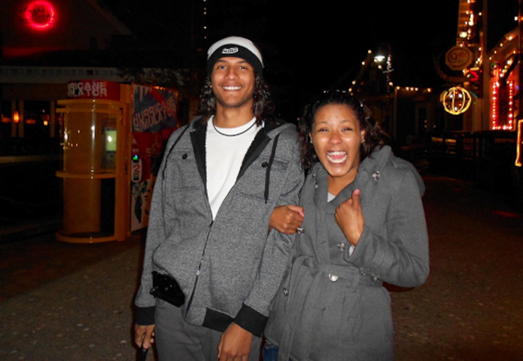 Airman 1st Class Jasmine Crump, 566th Intelligence Squadron network intelligence analyst, right, and Airman 1st Class Daniel Crump, 460th Operations Group data systems operator, enjoy a night out together. The Crumps are both siblings and first term airmen at Buckley Air Force Base, Colo. (courtesy photo)
