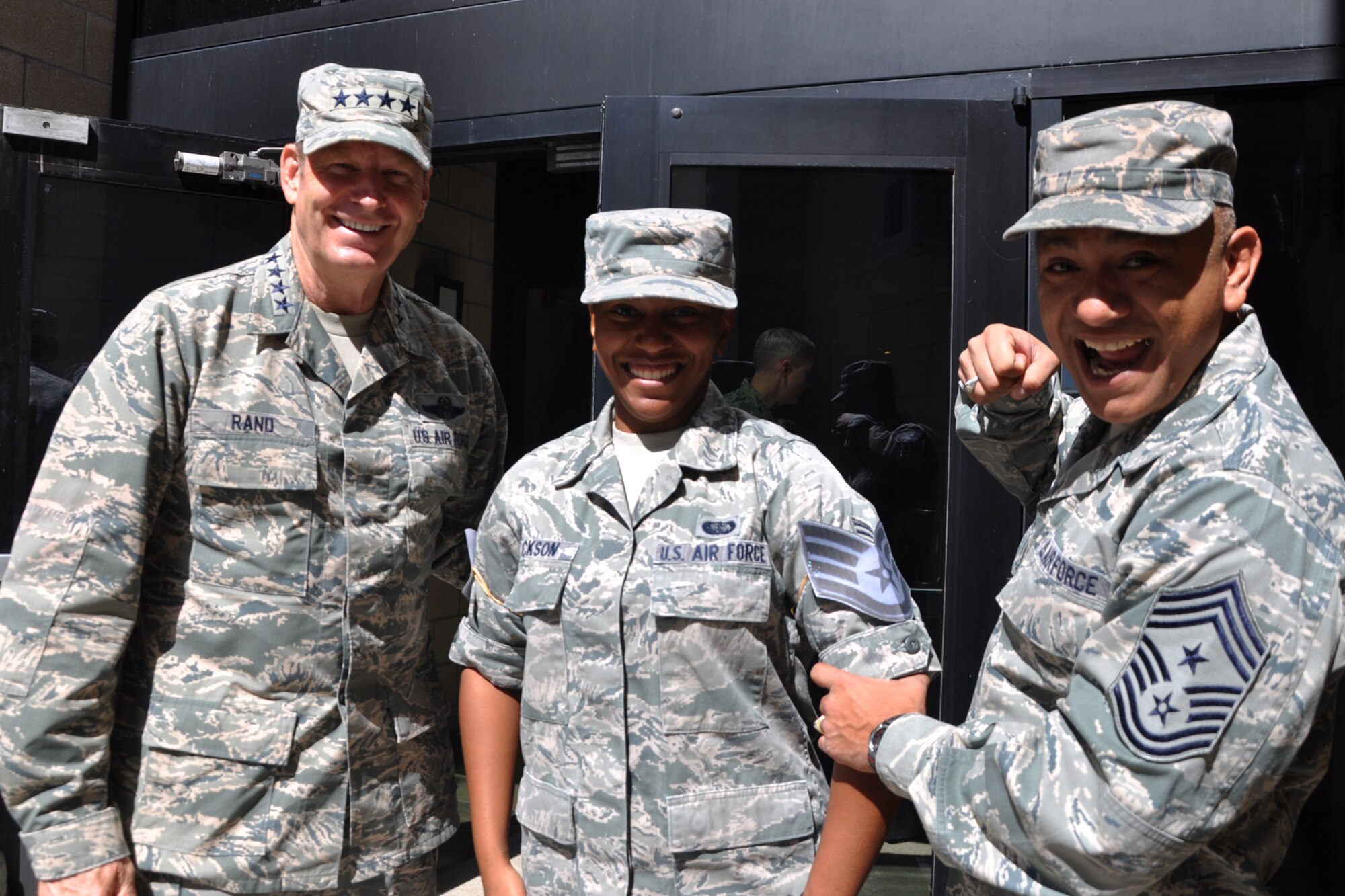 GOODFELLOW AIR FORCE BASE, Texas - Gen. Robin Rand, commander of Air Education and Training Command, and Chief Master Sgt. Gerardo Tapia Jr., AETC command chief master sergeant, congratulate Senior Airman Yolanda J. Jackson, 17th Training Wing Protocol, for her selection to be promoted to staff sergeant. (U.S. Air Force photo/ Airman 1st Class Breonna Veal)