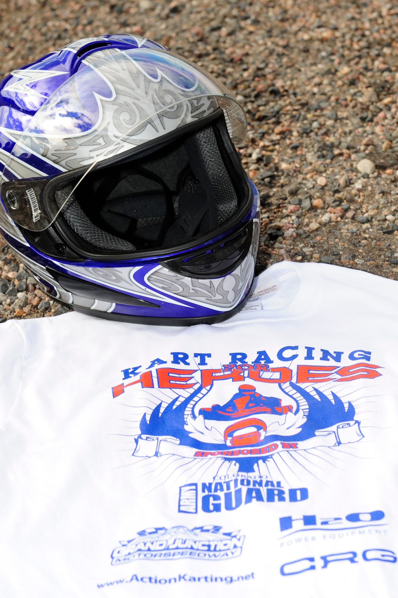 Team Buckley and local community members raced in the Kart Racing for Heroes event July 12, 2014, at Bandimere Speedway in Morrison, Colo. The event honored Senior Airman Michael Snyder and Senior Airman Kristopher Mansfield, both members of the 460th Space Communications Squadron who were killed by drunk drivers. (U.S. Air Force photo by Airman 1st Class Samantha Saulsbury/Released)