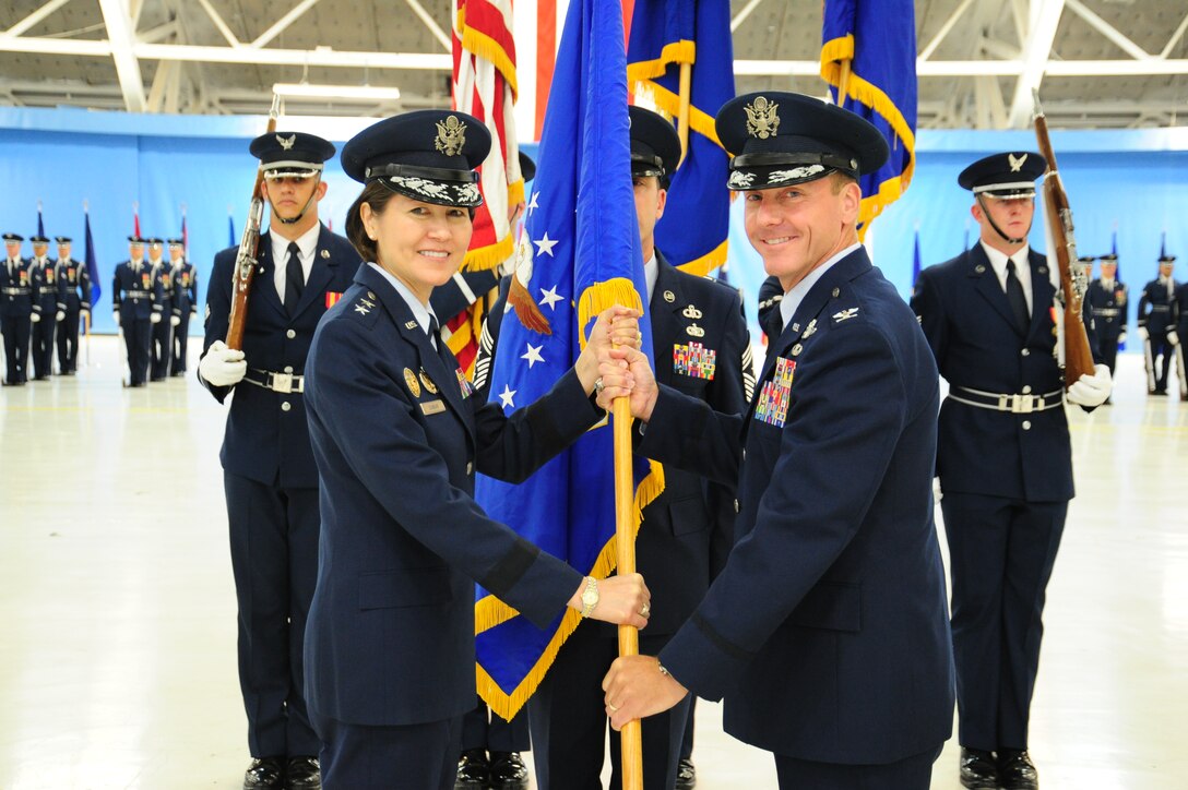 Col. Bradley Hoagland assumes command for the 11th Wing change of command ceremony at Joint Base Andrews, Md., July 14, 2014. The ceremony transfers command from Col. Bill Knight. (U.S. Air Force photo/Airman 1st Class Joshua R. M. Dewberry)