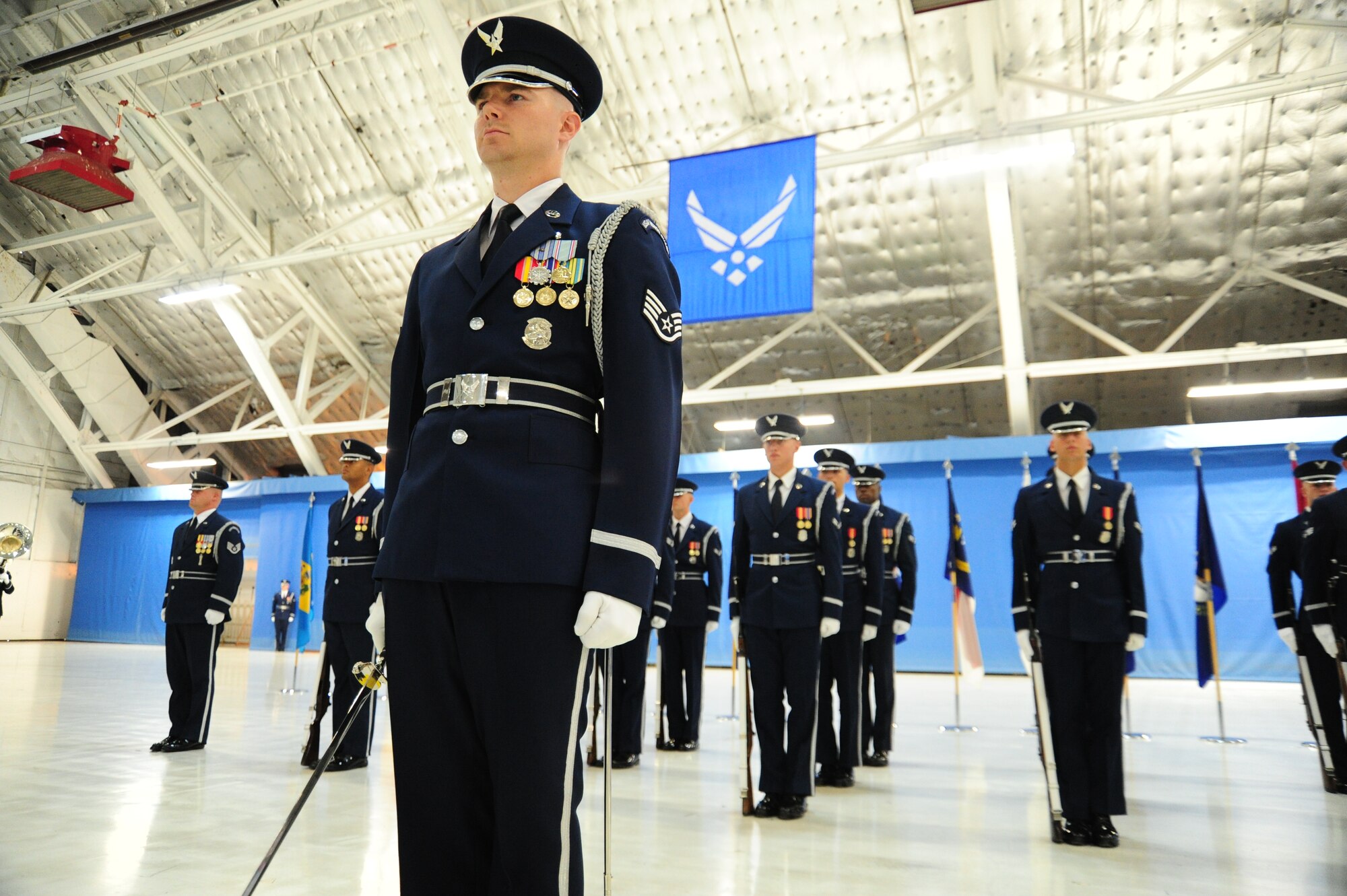 U.S. Air Force Honor Guard members take position for the 11th Wing change of command ceremony at Joint Base Andrews, Md., July 14, 2014.The ceremony transfers command from Col. Bill Knight to Col. Bradley Hoagland. (U.S. Air Force photo/Airman 1st Class Joshua R. M. Dewberry)