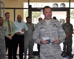 Chief Master Sgt. William Cavenaugh is all smiles after accepting the position of Air Force Recruiting Service command chief Aug. 30, 2011. After 30 years of service to the Air Force, Cavenaugh  will retire in a ceremony at Joint Base San Antonio-Randolph, Texas, July 17.(U.S. Air Force photo/Tech. Sgt. Hillary Stonemetz)