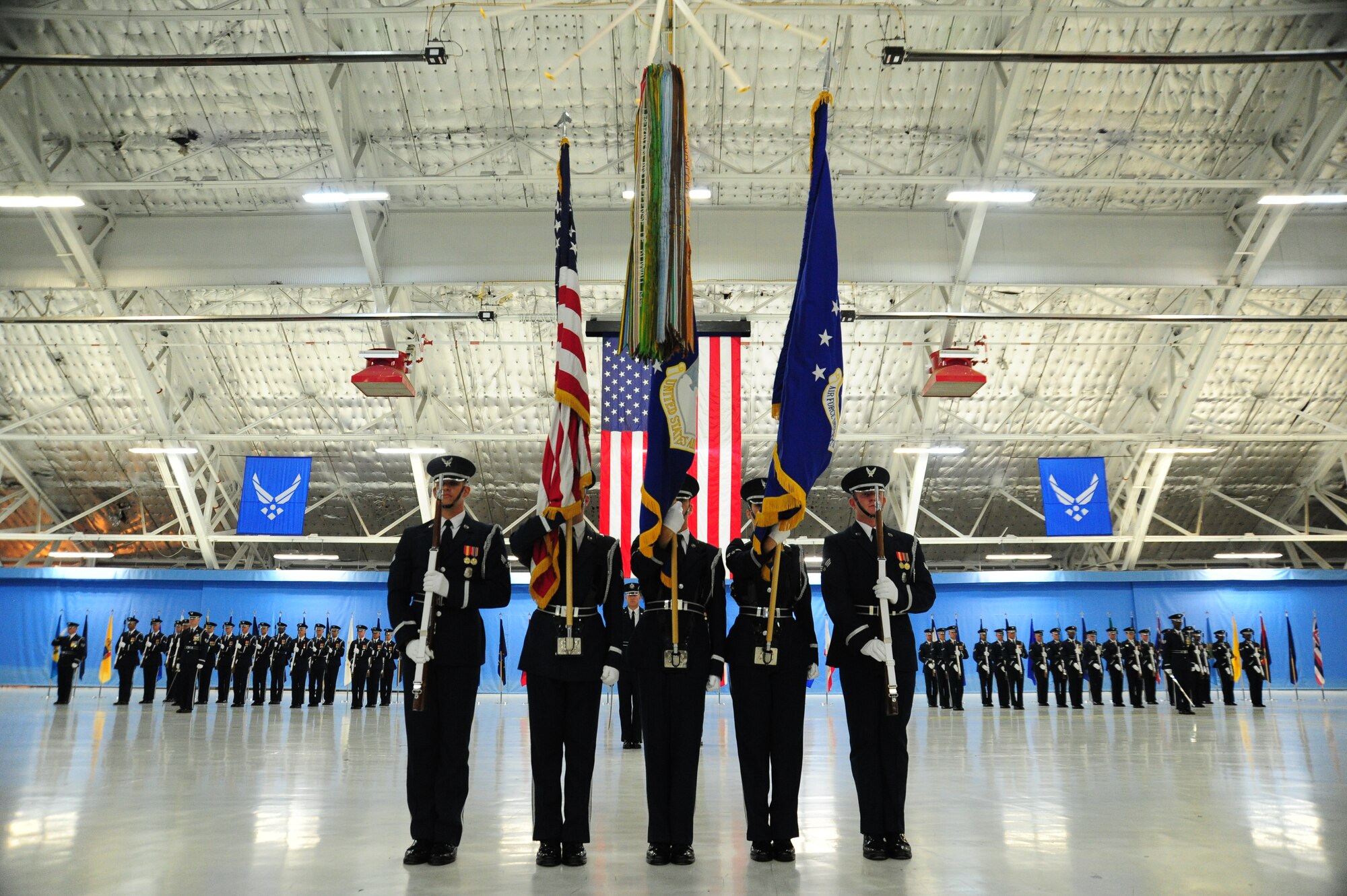 U.S. Air Force Honor Guard members post the colors for the 11th Wing change of command ceremony at Joint Base Andrews, Md., July 14, 2014. The ceremony transfers command from Col. Bill Knight to Col. Bradley Hoagland. (U.S. Air Force photo/Airman 1st Class Joshua R. M. Dewberry)