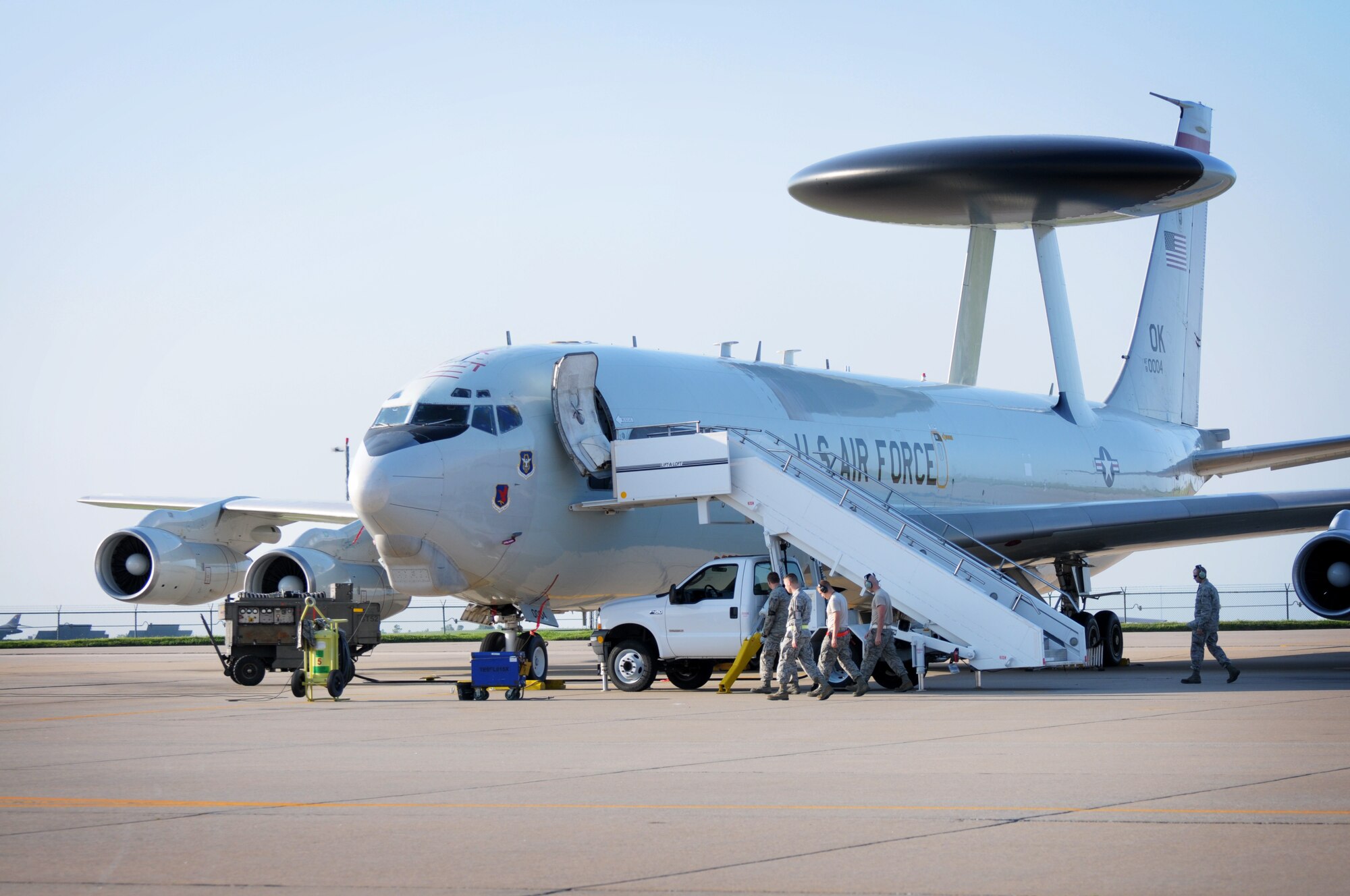 Reservists with the 513th Air Control Group prepare an E-3 Sentry for a training mission at Tinker Air Force Base, Okla. The 513th is slated to fly in this year's Rim of the Pacific, or RIMPAC exercise around the Hawaiian islands. (U.S. Air Force Photo/Staff Sgt. Caleb Wanzer)