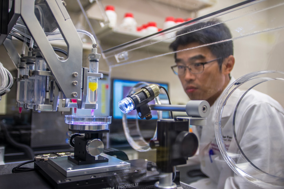 Research fellow Dr. Young Joon Seol works on a project to print experimental muscle tissue for reconstructive surgery. The U.S. Army is a significant proponent and investor in regenerative medicine and 3-D bioprinting, according to officials. Scientists are aiming to advance this new research area to help injured service members recover from the wounds of war. (Courtesy photo)