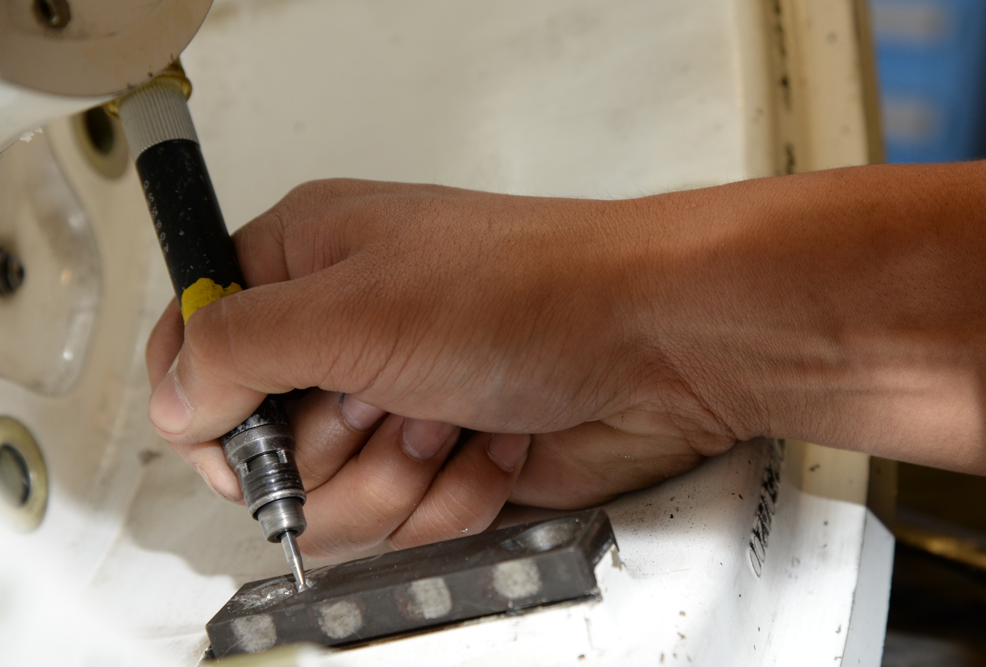 Airmen use the 9XL driver to remove studs from various aircraft parts including the landing gear wheel. This tool is one of many Airmen in the 23rd Equipment Maintenance Squadron fabrications flight use to repair and modify aircraft and equipment. (U.S. Air Force photo by Staff Sgt. Eric Summers Jr./Released)