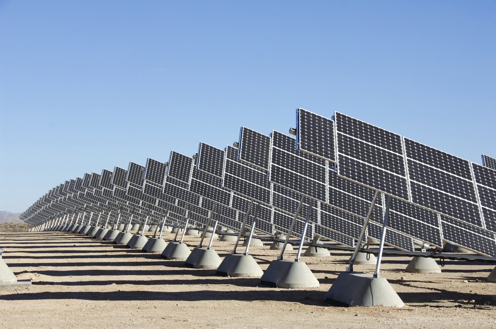 The solar photovoltaic power system at Nellis Air Force Base, Nev., is the largest solar photovoltaic array in the United States. There are plans to expand the 14-megawatt solar power production at the base. The Air Force recently signed a lease with Nevada Energy to add a 19-megawatt solar array. Together the projects will provide 42 percent of the energy needed to power Nellis. (U.S. Air Force photo) 