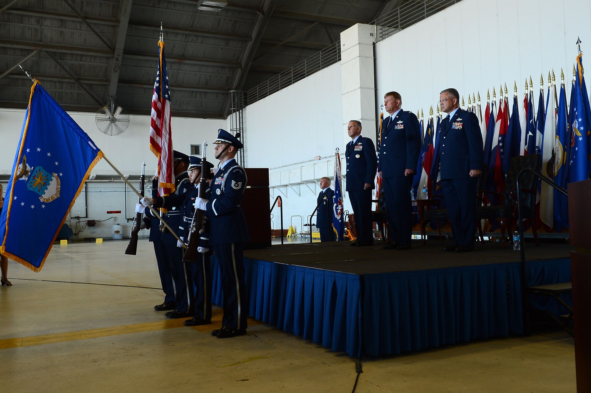 The 927 ARW honor guard present the colors during a change of command ceremony at MacDill AFB, July 13th. Brig. Gen. John Flournoy officiated the change of command ceremony as Col Doug Schwartz relinquished command to Col Randall Bright. (U.S. Air Force photo by SrA Vernon Fowler)