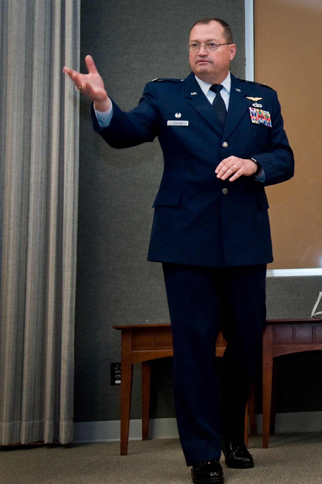 Col. Bryan Runion, 434th Logistics Readiness Squadron commander, speaks to the Airmen he commanded during a special pin-on ceremony at Grissom Air Reserve Base, Ind., June 7, 2014. Runion was recently promoted to the rank of colonel in front of family, friends and peers. (U.S. Air Force photo/Staff Sgt. Benjamin Mota)
