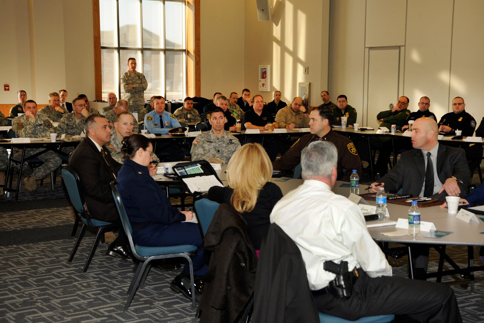 More than 20 law enforcement agencies trekked to The Michigan National Guard's 127th Wing Feb. 9, 2012, as the FBI held a field office visit and table top exercise designed to guide actions that would be utilized during an actual weapons of mass destruction contingency response in the Detroit area. Several Michigan National Guard entities were present, including the 51st Civil Support Team, many members of the 127th Wing's first responders and Mission Support Group, and representatives from the state Emergency Operations Center. Also present were representatives from the U.S. Attorney's Office, Dearborn Police Department, Customs and Border Protection, the Coast
Guard's Sector Detroit Enforcement Division, the Drug Enforcement
Administration, Detroit Police Department, and the Macomb County Sheriff's office, as well as the Detroit FBI office.