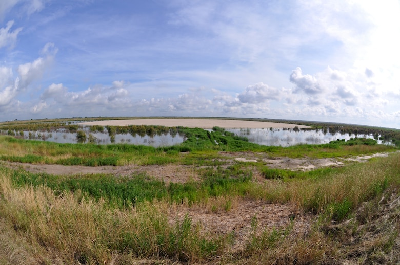 A "fish-eye" view of the newly-constructed 8-acre bird island at the Savannah Harbor Dredged Material Containment Area 12A, May 30, 2014. 


