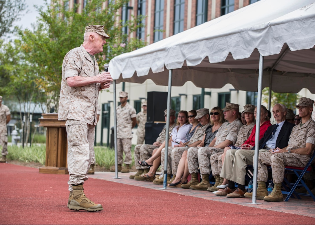 Lt. Gen. Richard P. Mills, commanding general of Marine Forces Reserve, delivers words of praise for 4th Marine Logistics Group during a change of command ceremony July 13, 2014. The mission of 4th MLG is to provide general and direct support and sustained combat service support to the Marine Air-Ground Task Force.  (U.S. Marine Corps photo by Lance Cpl. Mackenzie Schlueter/Released)