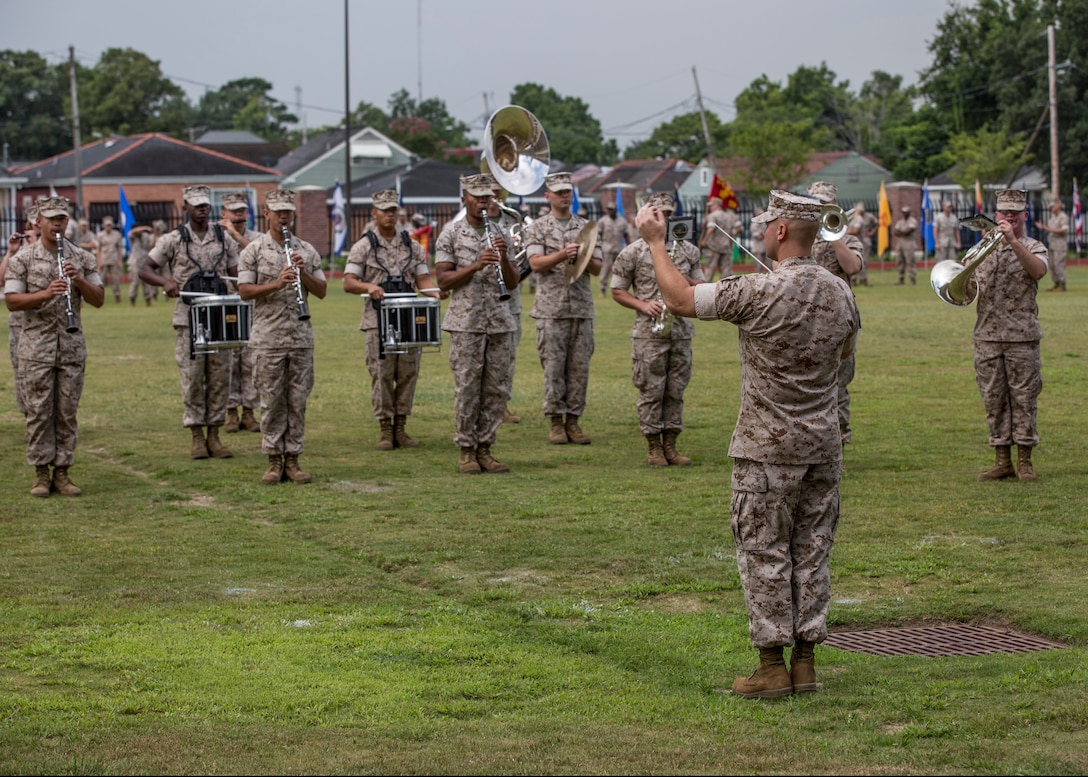 Marine Corps Band New Orleans plays during the change of command ceremony for 4th Marine Logistics Group, July 13, 2014. Brig. Gen. Patrick J. Hermesmann is the new commanding general of 4th MLG, receiving command from Brig. Gen. Roger R. Machut.  Marine Corps Band New Orleans performs at numerous ceremonies and occasions each year.(U.S. Marine Corps photo by Lance Cpl. Mackenzie Schlueter/Released)