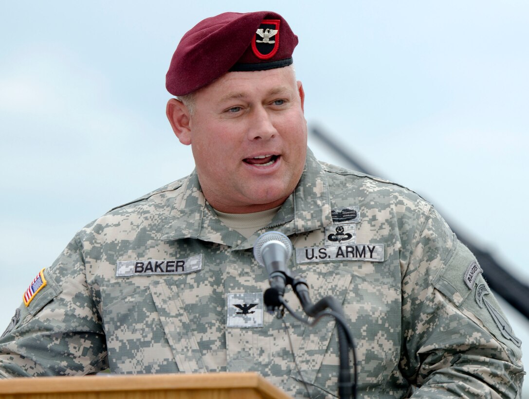 Outgoing commander Col. Steve Baker donned an Airborne Special Operations beret for his new assignment at Fort Bragg after relinquishing command of the Wilmington District.  