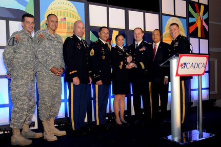 The Florida National Guard Counterdrug Program was presented the 2012 Outstanding State National Guard Civil Operations Program Award during the 2012 Community Anti-Drug Coalitions of America National Leadership Forum in Washington, D.C., Feb. 7, 2012. The Program was recognized for their outstanding and longstanding commitment to community coalitions in Florida.