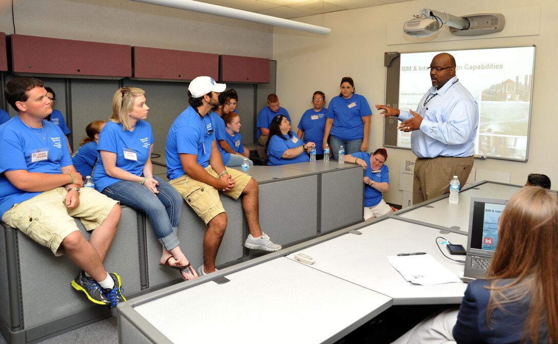 Jelani Ingram, architect, Architectural Branch, explains Building Information Modeling to Southeast Kentucky Community  and Technical College Upward Bound students during Team Redstone tour.