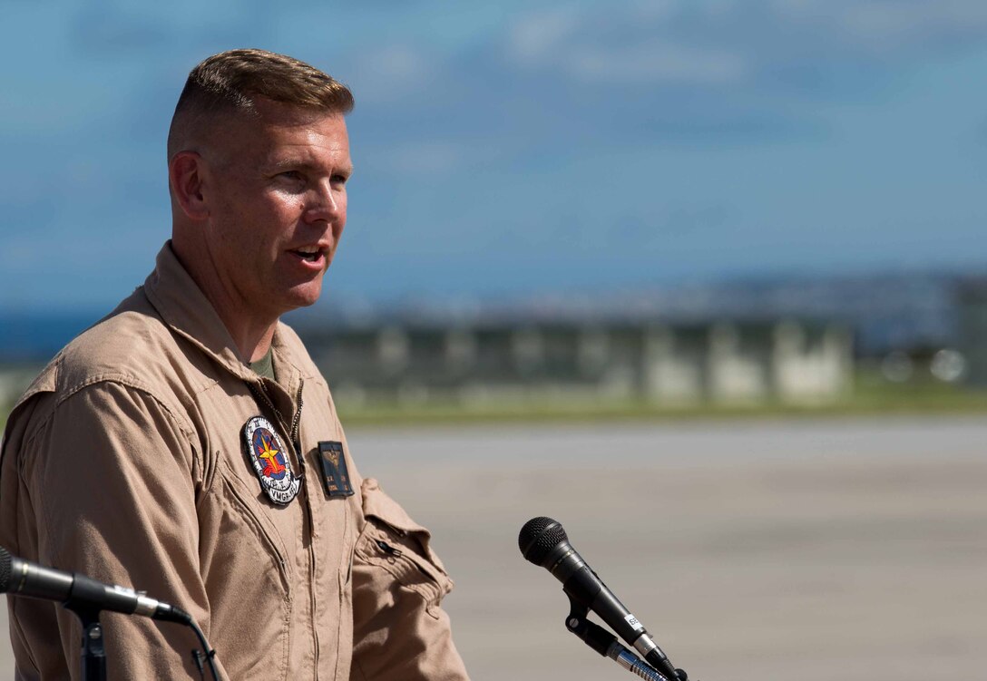 Lt. Col. Matthew W. Stover thanks Okinawa and its residents on behalf of Marine Aerial Refueler Transport Squadron 152 July 15 on Marine Corps Air Station Futenma during the squadron’s take off ceremony. The ceremony commemorates the beginning of VMGR-152’s transfer to MCAS Iwakuni as part of the Marine Corps and Government of Japan’s bilateral effort to reduce impact to communities around MCAS Futenma, realign the presence and distribute the activities of U.S. forces in Japan. Stover is the commanding officer of VMGR-152, Marine Aircraft Group 36, 1st Marine Aircraft Wing, III Marine Expeditionary Force. (U.S. Marine Corps photo by Cpl. Natalie M. Rostran/Released)