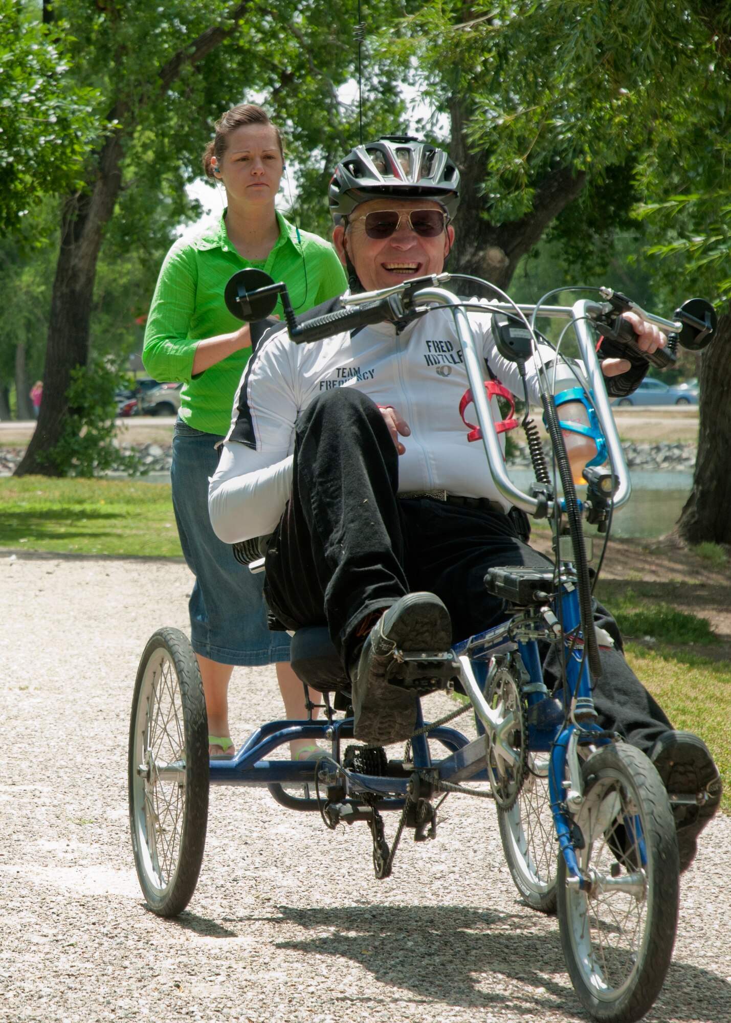 Fred Culek, a volunteer for the Walk in my Shoes fundraiser, leads participants through Holiday Park in Cheyenne, ¬¬¬Wyo., July 12, 2014. The money raised goes to the Wyoming Coalition for the Homeless to help support those in need.