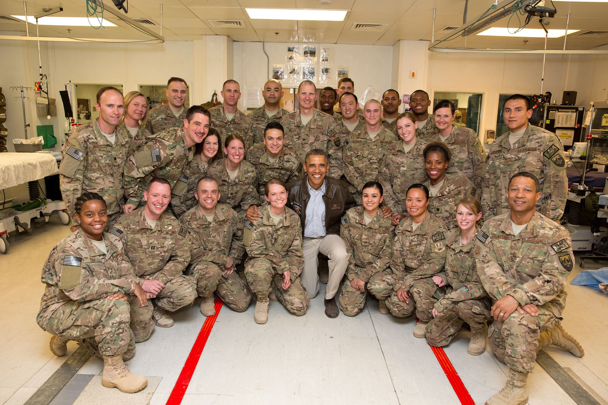 Members of the 455th Contingency Aerospace Staging Facility, pose for a
photo with President Barack Obama during his tour of the Craig Joint
Theatre Hospital, Bagram Airfield, Afghanistan. Members of the 455th CASF
care for and prep severely-injured service members for aeromedical
transport to specialized military treatment facilities outside Afghanistan.
Several members of the 455th CASF are deployed from the 59th Medical Wing
at Joint Base San Antonio-Lackland, Texas. (Courtesy photo)