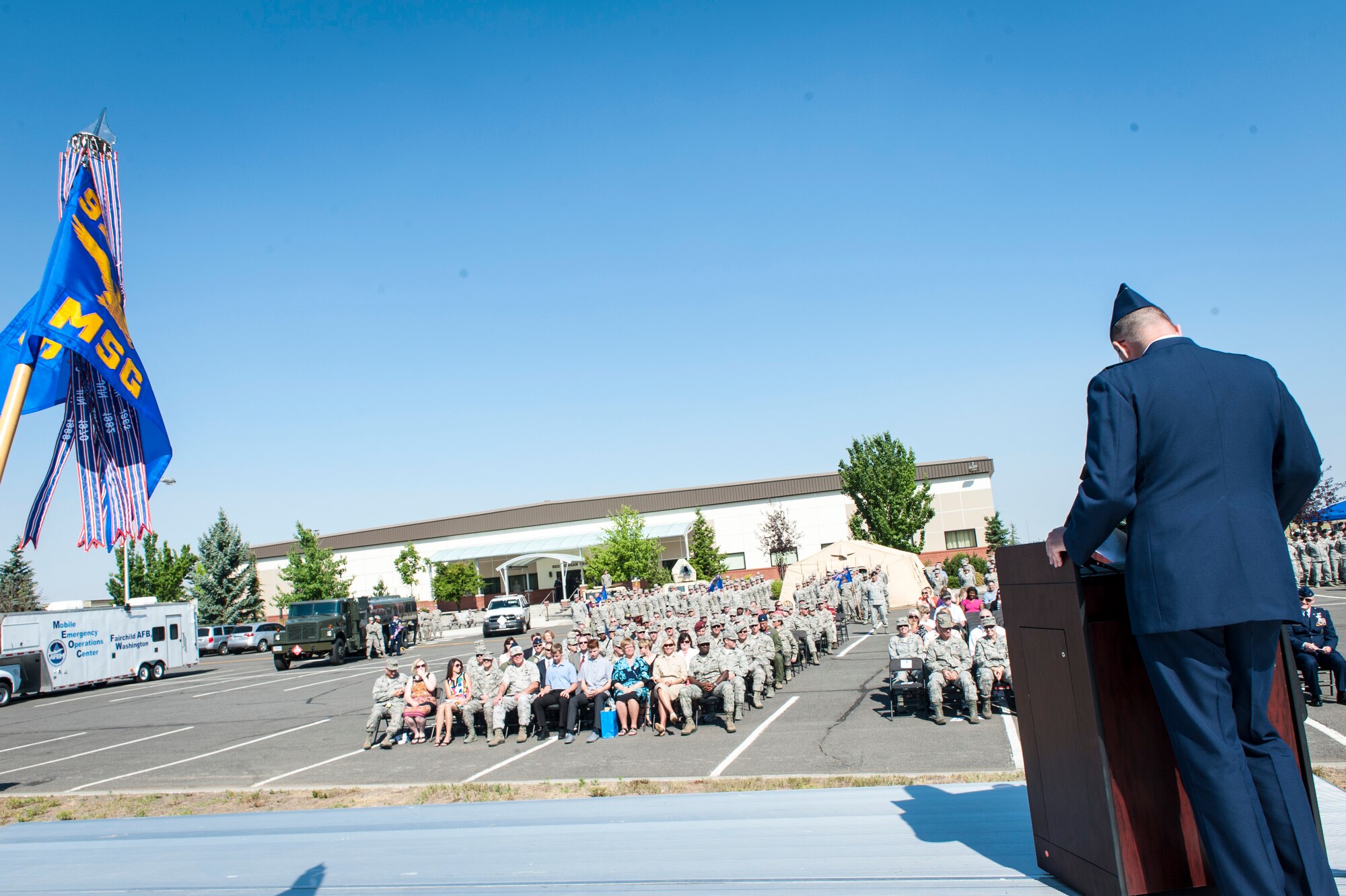 Col. David Stookey addresses Fairchild Airmen and community members during the 92nd Mission Support Group change of command ceremony at Fairchild Air Force Base, Washington, July 11, 2014. The change of command ceremony is a tradition that represents a formal transfer of authority and responsibility. Stookey is the 92nd Mission Support Group commander. (U.S. Air Force photo by Staff Sgt. Benjamin W. Stratton/Released)