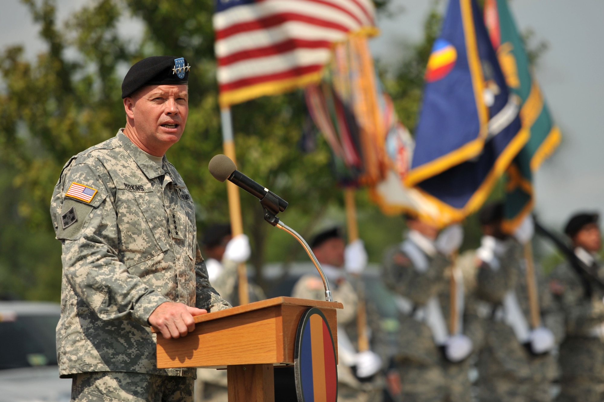U.S. Army Gen. David G. Perkins, Army Training and Doctrine Command commanding general, gives opening remarks during the TRADOC Army Capabilities Integration Center assumption of responsibility ceremony at Fort Eustis, Va., July 15, 2014.  Perkins welcomed Lt. Gen. H. R. McMaster, ARCIC incoming commander, and Sgt. Maj. Joe B. Parson, incoming command sergeant major. (U.S Air Force photo by Staff Sgt. Katie Gar Ward/Released)(Image was cropped and color corrected to enhance subject)