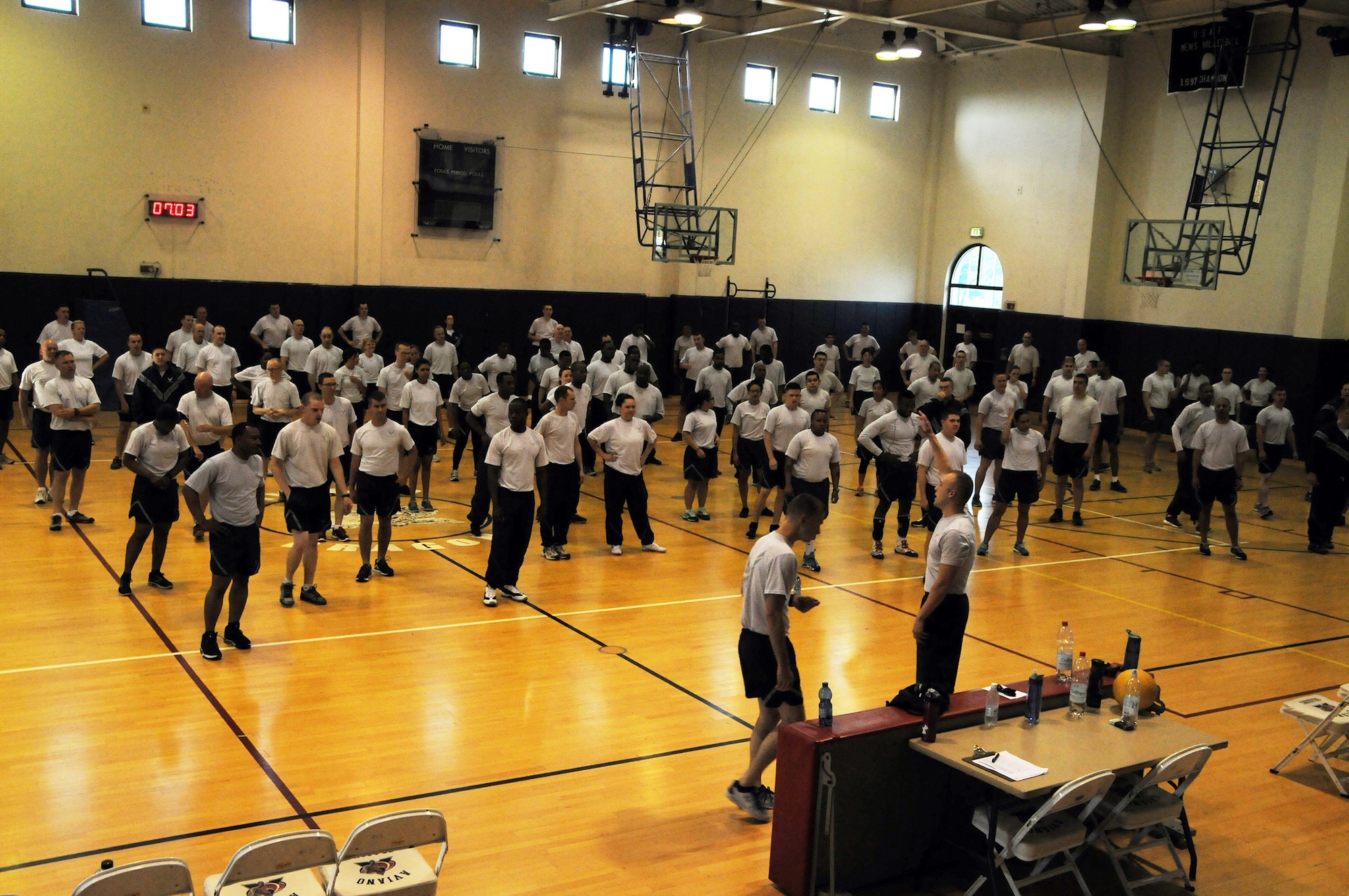 AVIANO AIR BASE, ITALY – Members of the 445th Logistics Readiness Squadron, participate in mass physical fitness training with members of the 31st Fighter Wing on June 17, 2014. The 445th Airlift Wing was tasked to assist with day-to-day duties as well as receiving valuable training while deployed to Italy. (U.S. Air Force Photo/ Tech. Sgt. Anthony G. Springer)