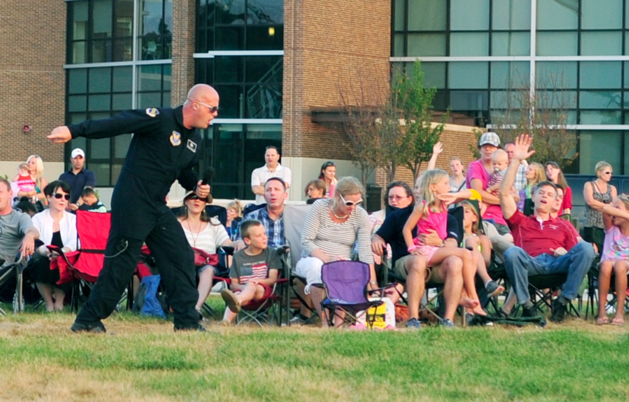 Senior Master Sgt. Ryan Carson, a vocalist for "Max Impact," performs during the Joint Base Andrews Heritage Park Concert, July 12, 2014. The concert series was designed to show appreciation to the local community for their support and showcase JBA's dedicated Airmen. This was the second of three concerts scheduled for this summer. (U.S. Air Force photo/Staff Sgt. Torey Griffith)