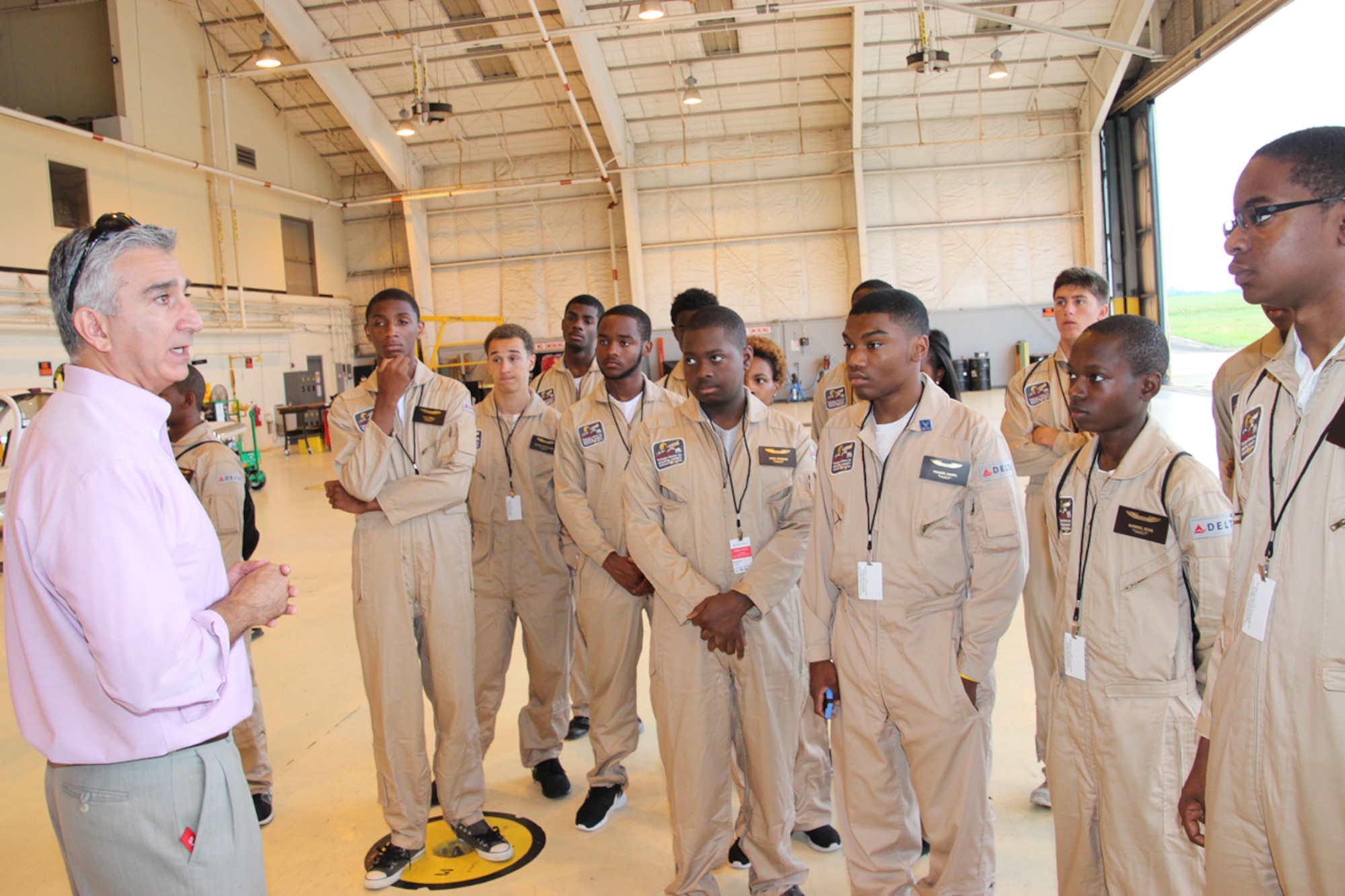 James K. Soltani, facility supervisor, gives Tuskegee Airmen Aviation Career Training cadets a tour of, and provides them with information on the center’s mission. (Photo by Mose Ensley)