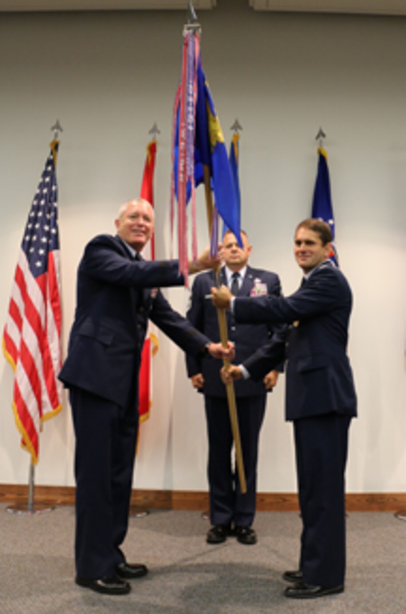 Col. Michael J. Norton (right) receives the guidon from Lt. Gen. William H. Etter, Commander, CONR-1AF (AFNORTH) on July 11 during EADS assumption of command ceremony. 