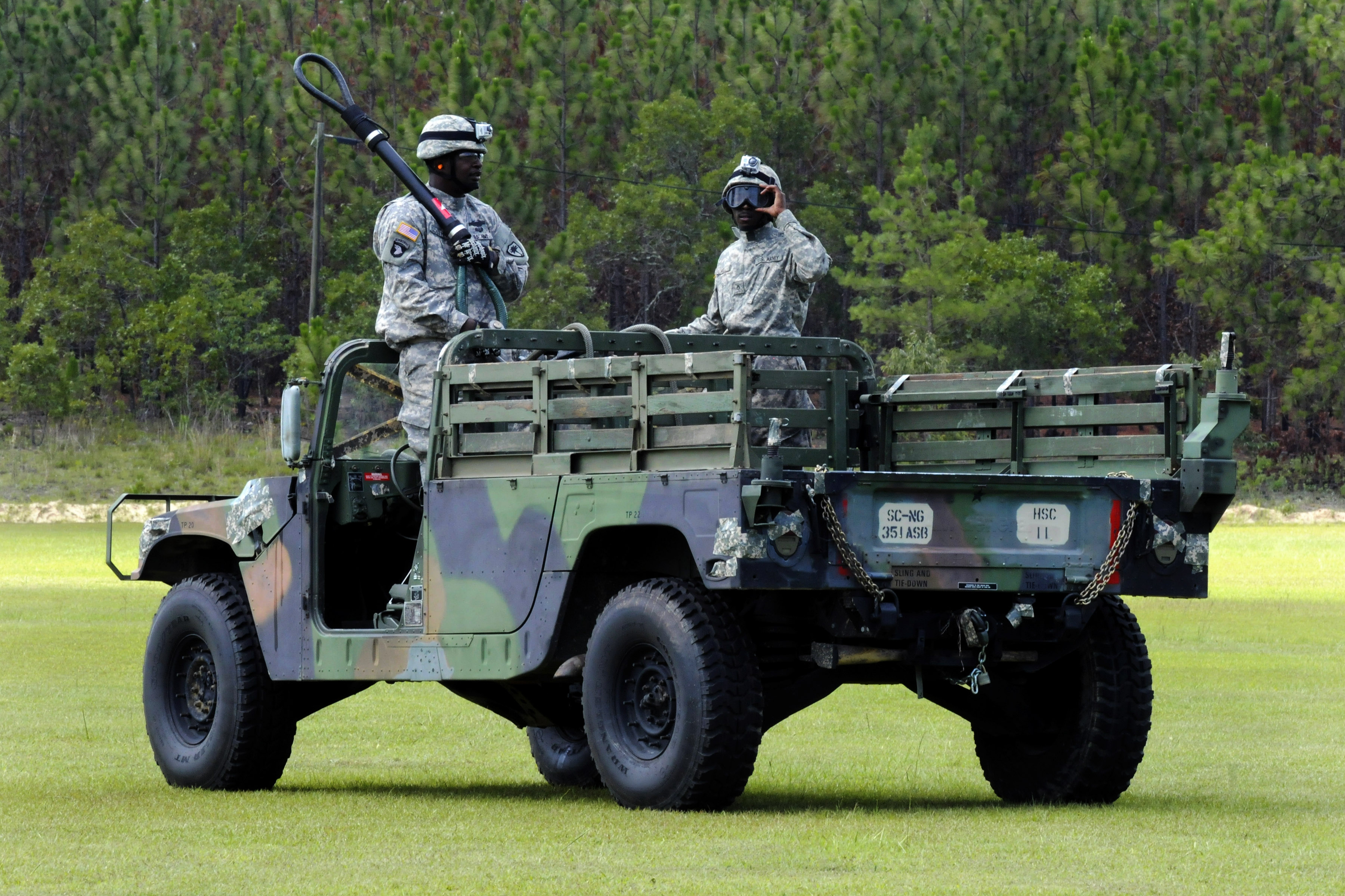 Army Sgt. Eddie Couthen, left, and Army Pfc. Senquan Alls prepare to ...