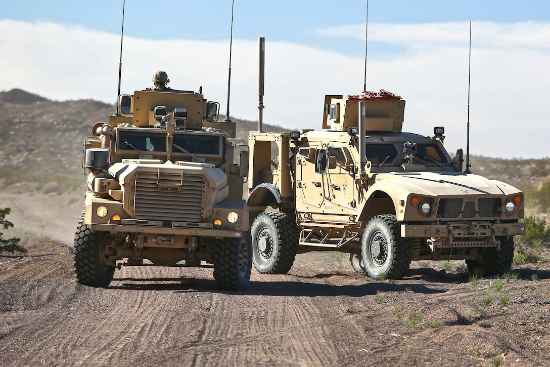 Marines with Combat Logistics Battalion 1, Combat Logistics Regiment 1, 1st Marine Logistics Group, conduct a combat logistics patrol during the Marine Readiness Exercise aboard Marine Corps Air Ground Combat Center Twenty-nine Palms, Calif., March 24, 2014. The MRX is the culminating exercise of the month-long Integrated Training Exercise 3-14 that prepares the battalion for its role, as the logistics combat element, in the final combat deployment in support of Operation Enduring Freedom.