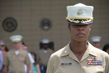 Major Aaron Lloyd relinquishes command of Recruiting Station Chicago to Major Shanelle Porter during a Change of Command ceremony, June 16. Porter is the first female commanding officer to take charge of Recruiting Station Chicago.