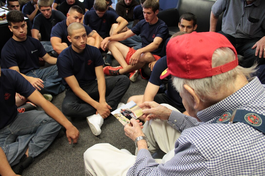 Pfc. William Faulkner talks to poolees from Recruiting Sub-station Aurora, Recruiting Station Chicago about his experience during the Battle of Iwo Jima.