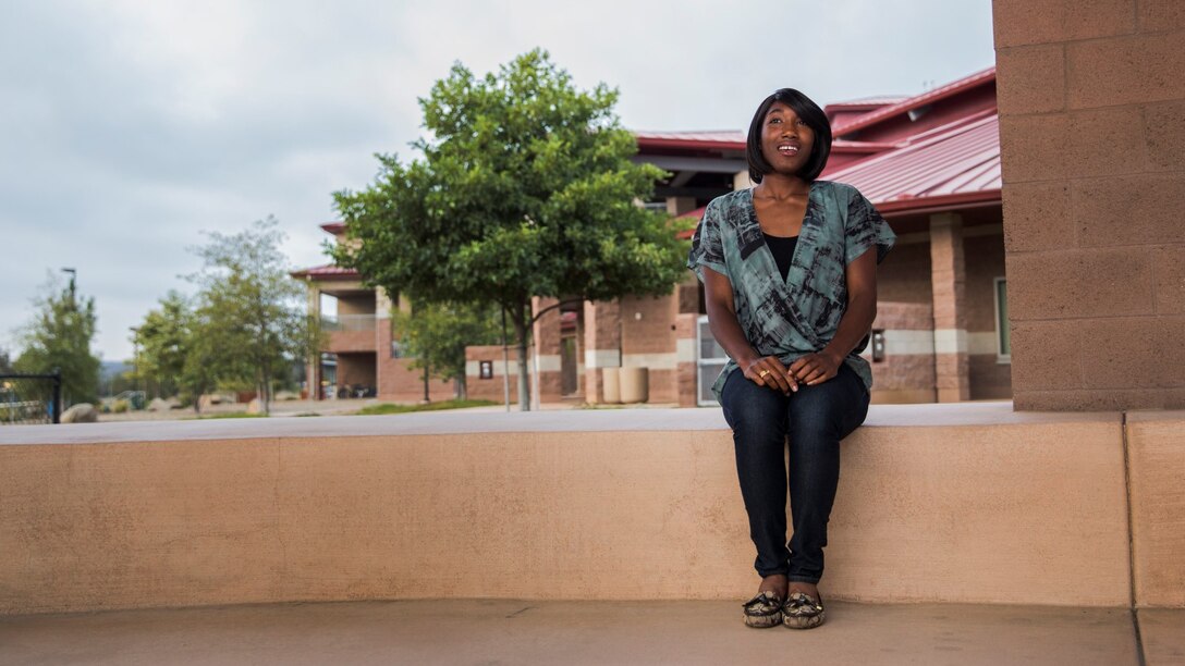 Corporal Ashton Tyler, warehouse clerk, 15th Marine Expeditionary Unit, relaxes from the rigors of work by singing aboard Camp Pendleton, Calif., July 15, 2014. Tyler, 22, is from Charleston, South Carolina. (U.S. Marine Corps photo by Cpl. Emmanuel Ramos/Released)