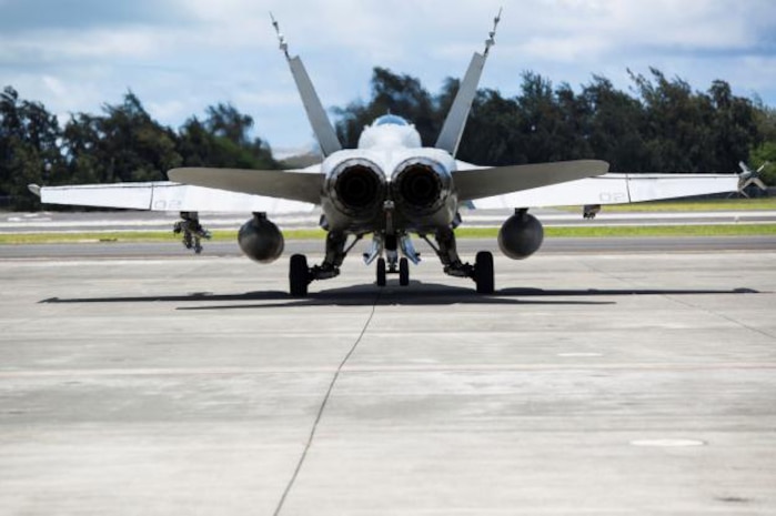 An F/A-18C Hornet with Marine Fighter Attack Squadron 122 prepares to take off aboard Marine Corps Base Hawaii, July 2, 2014. Marine Fighter Attack Squadron 122 is in Hawaii in support of Rim of the Pacific Exercise 2014, the world’s largest international maritime warfare exercise. The squadron is currently a part of the Unit Deployment Program with Marine Aircraft Group 12, based out of Marine Corps Air Station Iwakuni, Japan.