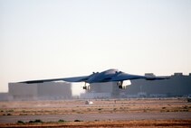 A B-2 Spirit bomber takes off July 17, 1989, from the Northrop Grumman production facility in Palmdale, California on its inaugural flight to Edwards Air Force Base, California. The B-2 would remain in the testing phase until 1993, when the first operational aircraft was delivered to Whiteman AFB, Missouri. (Defense Imagery Management Operations Center photo/Released) 