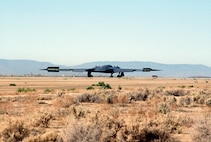 The first ever B-2 Spirit bomber to fly, lands July 17, 1989, at Edwards Air Force Base, California after its first flight. The B-2 is a global strike capable aircraft which provides a layer of strategic deterrence for threats that emerge in the world. (Defense Imagery Management Operations Center photo/Released) 