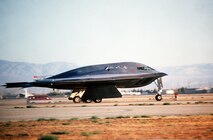 A B-2 Spirit bomber takes off July 17, 1989, from the Northrop Grumman production facility in Palmdale, California on its inaugural flight to Edwards Air Force Base, California. The B-2 would remain in the testing phase until 1993, when the first operational aircraft was delivered to Whiteman AFB, Missouri. (Defense Imagery Management Operations Center photo/Released) 