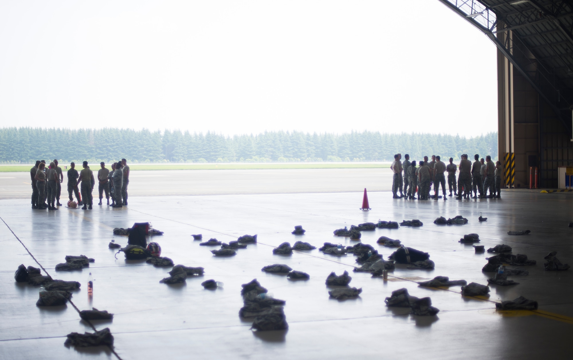 Members of the 374th Medical Group receive self-aid and buddy care training at Yokota Air Base, Japan, July 16, 2014. SABC is given to sustain a patient until further medical assistance can be given. (U.S. Air Force photo by Staff Sgt. Chad C. Strohmeyer/Released)