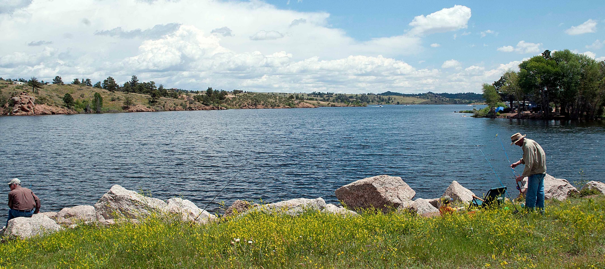 140713-F-CQ929-163 Fishermen cast their lines into the Granite Springs Reservoir of Curt Gowdy State Park, Wyo., July 11. Curt Gowdy offers three reservoirs for fishing: Granite Springs Reservoir, Crystal Reservoir and North Crow Reservoir, each having a different selection of fish. (Courtesy photo by Airman 1st Class Siobhan Lynch)