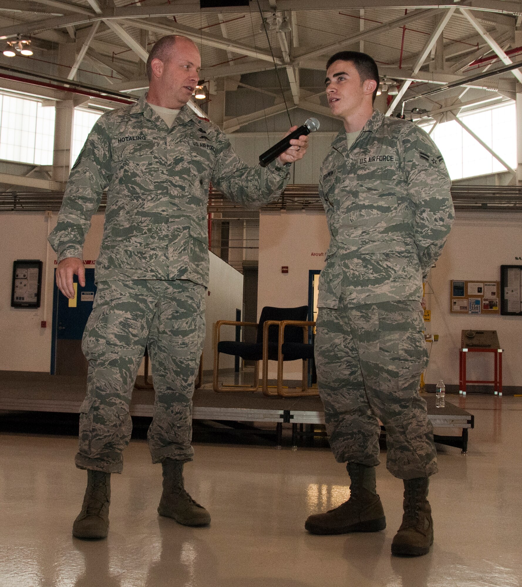 Air National Guard Command Chief James W. Hotaling speaks to members of the 129th Rescue Wing during a visit to Moffet Federal Airfield, Calif., July 12, 2014. Hotaling spoke to Airmen about the past, present and future of the ANG. (U.S. Air National Guard photo by Senior Airman Rachael Kane/Released)