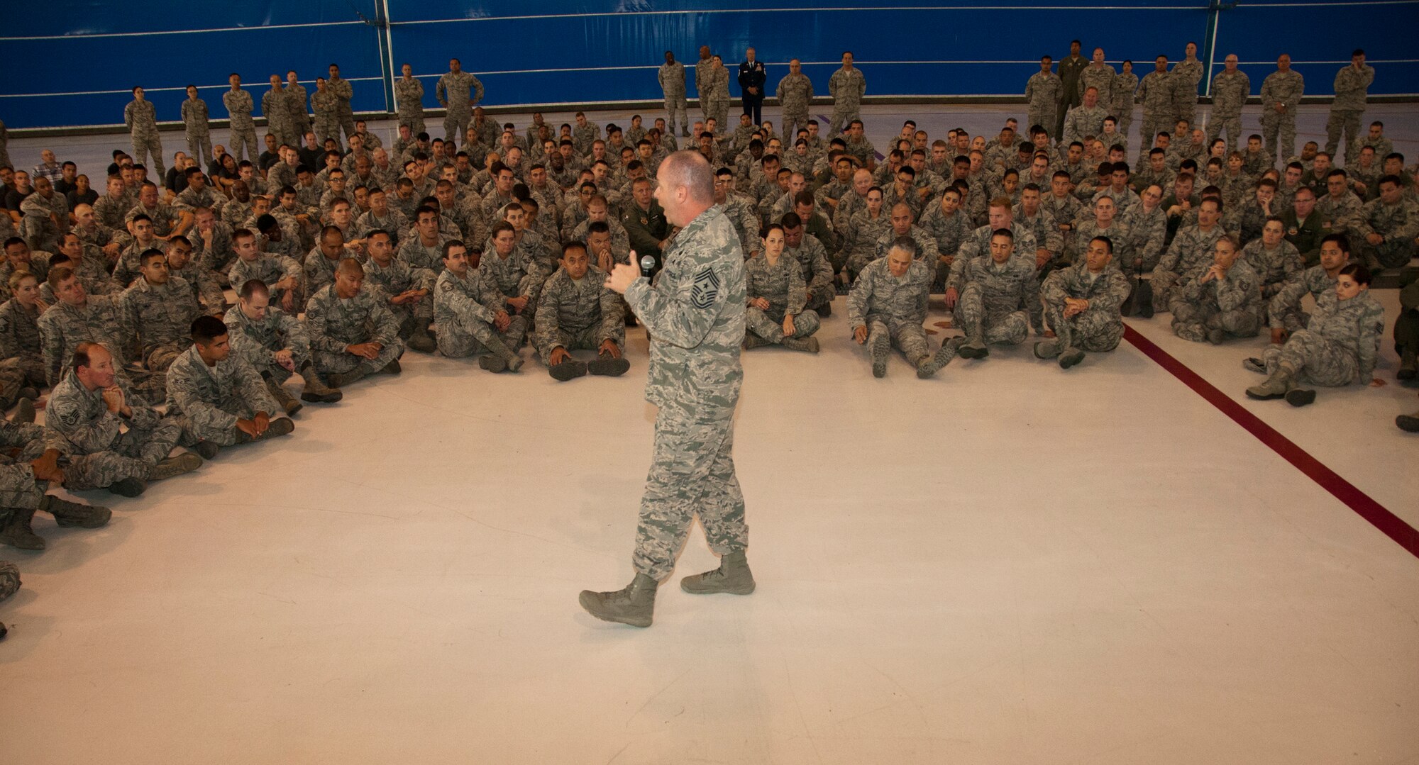 Air National Guard Command Chief James W. Hotaling speaks to members of the 129th Rescue Wing during a visit to Moffet Federal Airfield, Calif., July 12, 2014. Hotaling spoke to Airmen about the past, present and future of the ANG. (U.S. Air National Guard photo by Senior Airman Rachael Kane/Released)