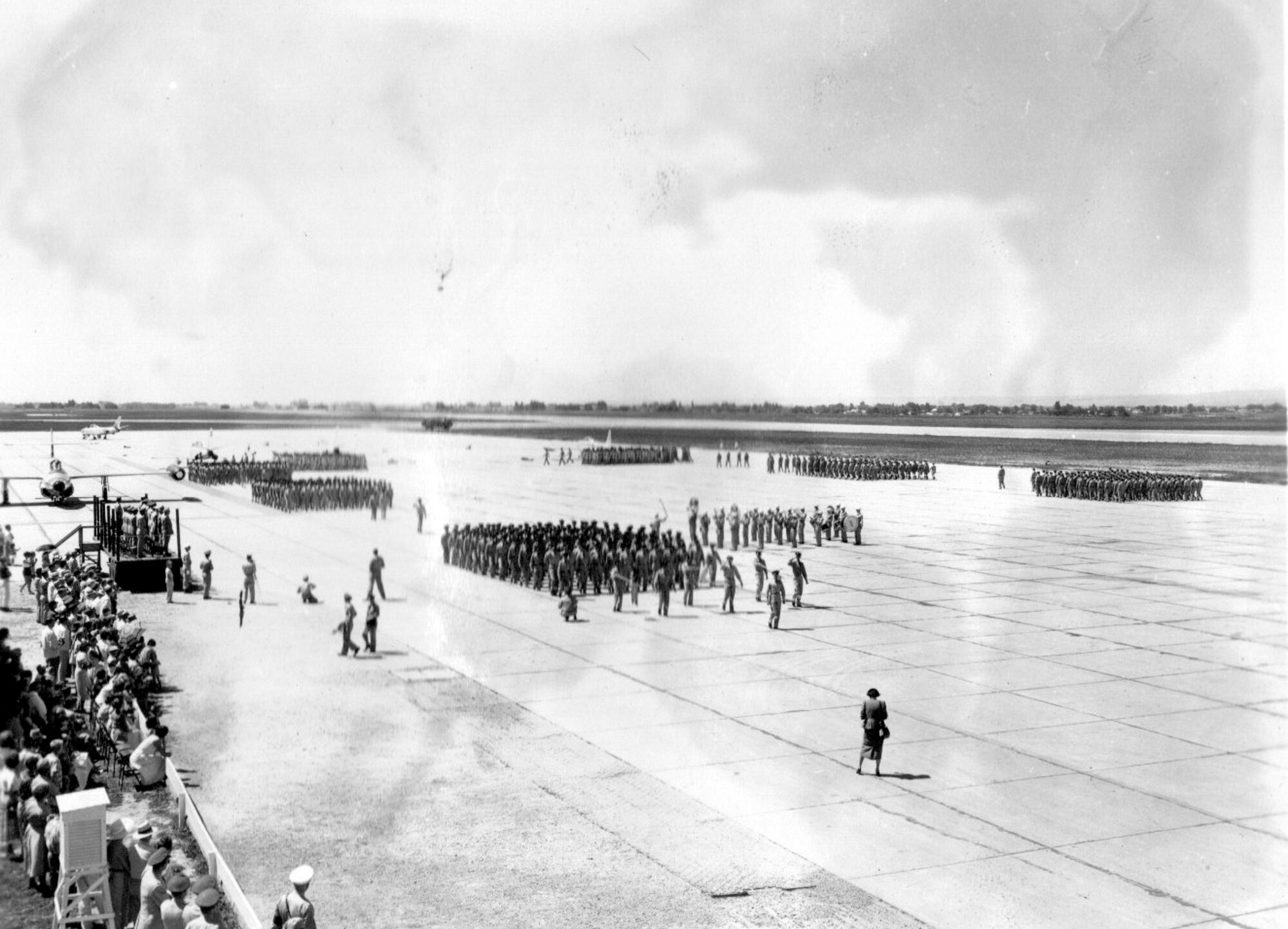 View of the members of the 142nd Fighter-Interceptor Wing on parade during Governors Day at Gowen Field, Idaho, June 23, 1954.  Note the VIP stand at the left.  Just beyond it is a Northrop F-89 Scorpion fighter-interceptor, an aircraft the Oregon ANG would begin to operate just a few years later.  (Courtesy 142FW History Archives)