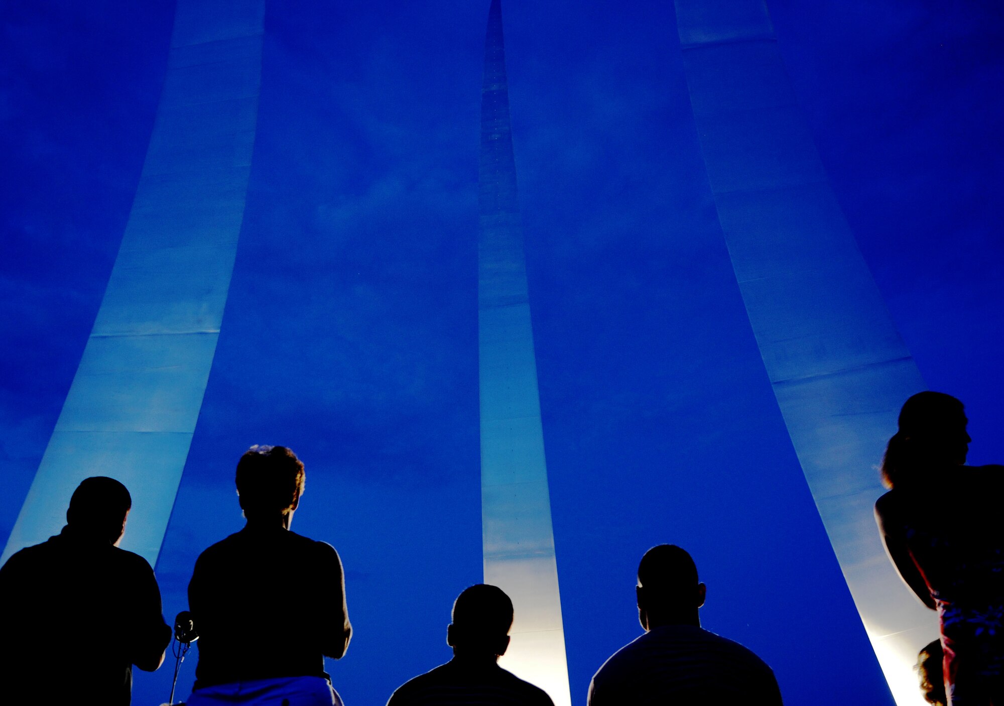 Guests of the Air Force Memorial in Arlington, Va., stand to show their support for the Armed Forces on July 11, 2014. The United States Air Force Band performed at the memorial for their Summer Concert Series, which is held at various locations in the National Capital Region. (U.S. Air Force photo/Airman 1st Class Ryan J. Sonnier)