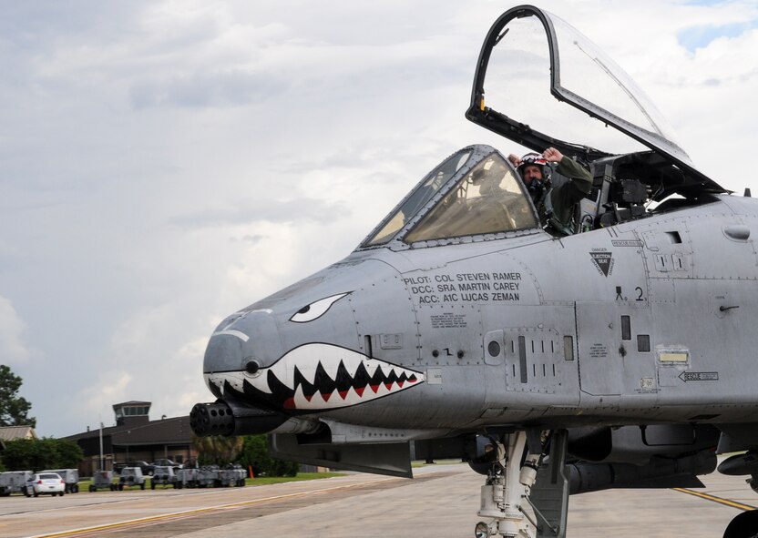U.S. Air Force Col. Steve Ramer, 23d Wing vice commander, celebrates after landing an A-10C Thunderbolt II during his fini flight, July 15, 2014 at Moody Air Force Base, Ga.  The fini flight is a military aircrew tradition that marks a pilot's last flight in an aircraft before he or she leaves a squadron. (U.S. Air Force photo by Andrea Jenkins/Released) 